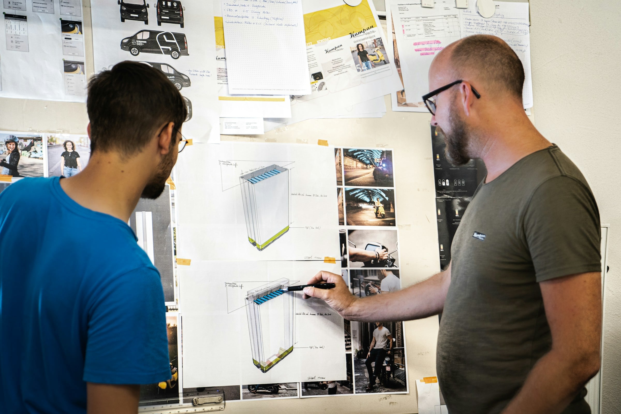 Engineers sketching a battery system layout